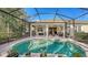 Inviting pool area with covered patio, creating a private oasis at 7275 Lismore Ct, Lakewood Ranch, FL 34202