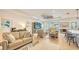 Open concept living room, kitchen and dining areas at 7275 Lismore Ct, Lakewood Ranch, FL 34202