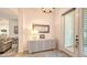 Bright entryway with white console table and mirror at 7275 Lismore Ct, Lakewood Ranch, FL 34202