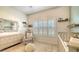 Bedroom featuring a crib, dresser, and a tranquil atmosphere at 7275 Lismore Ct, Lakewood Ranch, FL 34202