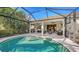 Enjoy this refreshing pool with extended patio and access to the interior at 7275 Lismore Ct, Lakewood Ranch, FL 34202