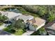 Community view showcasing homes and a pond at 7275 Lismore Ct, Lakewood Ranch, FL 34202