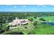 Resort-style clubhouse with golf course and lake views at 7275 Lismore Ct, Lakewood Ranch, FL 34202