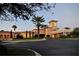 Elegant clubhouse entrance at dusk, offering a sophisticated ambiance at 7275 Lismore Ct, Lakewood Ranch, FL 34202