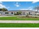 Updated ranch-style home with new landscaping and driveway at 353 Suwanee Ave, Sarasota, FL 34243