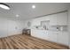 White kitchen cabinets and a quartz countertop at 353 Suwanee Ave, Sarasota, FL 34243