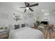 Spacious bedroom with a queen bed and window at 353 Suwanee Ave, Sarasota, FL 34243
