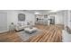 Light and airy living room with white couch and open concept design at 353 Suwanee Ave, Sarasota, FL 34243