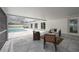 Relaxing pool area with covered patio and comfortable seating at 353 Suwanee Ave, Sarasota, FL 34243