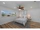Spacious bedroom with hardwood floors and ceiling fan at 353 Suwanee Ave, Sarasota, FL 34243