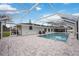 Relaxing pool area with covered patio and spacious deck at 353 Suwanee Ave, Sarasota, FL 34243