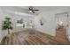 Bright home office with hardwood floors and built-in desk at 353 Suwanee Ave, Sarasota, FL 34243