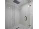 Large walk-in shower with glass enclosure and modern tile at 353 Suwanee Ave, Sarasota, FL 34243
