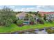 Home with a private pool and screened enclosure overlooking a canal at 13215 Ramblewood Trl, Bradenton, FL 34211