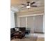 Spacious living room with sectional sofa and large window at 13215 Ramblewood Trl, Bradenton, FL 34211