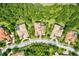 Aerial view of the community with mature landscaping and luxury homes featuring private pools at 13215 Palmers Creek Ter, Lakewood Ranch, FL 34202