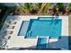 Relaxing pool with spa and lounge chairs at 3702 5Th Ave, Holmes Beach, FL 34217