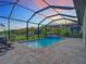 Screened-in pool and spa with patio area for relaxing at 177 Vinadio Blvd, Nokomis, FL 34275