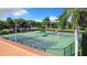 Well-maintained tennis courts with ample space at 177 Vinadio Blvd, Nokomis, FL 34275