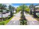 Attractive community entrance with palm trees and landscaping at 177 Vinadio Blvd, Nokomis, FL 34275