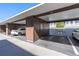 Covered parking garage with assigned spaces at 1602 Stickney Point Rd # 305, Sarasota, FL 34231