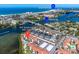 Aerial view of condo, pool, and Sarasota Bay at 1602 Stickney Point Rd # 305, Sarasota, FL 34231