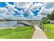 Private waterfront dock with walkway and access at 6157 Midnight Pass Rd # C12, Sarasota, FL 34242