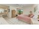 Spacious bedroom with comfortable bed and built-in storage at 6157 Midnight Pass Rd # C12, Sarasota, FL 34242