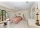 Relaxing bedroom with a comfortable bed and access to a balcony at 6157 Midnight Pass Rd # C12, Sarasota, FL 34242