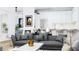Open concept living room and kitchen with modern furnishings at 3523 Trebor Ln, Sarasota, FL 34235