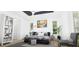 Serene bedroom with a king-size bed and built-in shelving at 3523 Trebor Ln, Sarasota, FL 34235