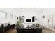 Sophisticated living room with dark accents at 3523 Trebor Ln, Sarasota, FL 34235