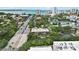 Aerial view of condo building near the water at 1650 Pine Tree Ln # 103, Sarasota, FL 34236