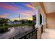 Beautiful balcony view overlooking the water fountain on a sunset view at 1450 Silvia Shores Dr, Apollo Beach, FL 33572