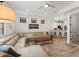 Open-concept living room featuring a large sectional sofa open to the kitchen at 1450 Silvia Shores Dr, Apollo Beach, FL 33572