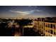 Night view of the community showing city lights and celestial cloud formation, hinting at a luxurious lifestyle at 1450 Silvia Shores Dr, Apollo Beach, FL 33572
