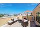 Rooftop patio features outdoor seating, fire pit, and neighborhood views at 1450 Silvia Shores Dr, Apollo Beach, FL 33572