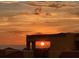 Sunset view from the community, with a glimpse of the ocean highlighting the serene ambiance at 1450 Silvia Shores Dr, Apollo Beach, FL 33572