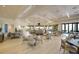 Bright dining room with modern tables and chairs at 17704 Gawthrop Dr # 402, Bradenton, FL 34211
