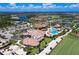 Aerial view of community with clubhouse, pool, and golf course at 17704 Gawthrop Dr # 402, Bradenton, FL 34211