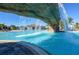 Relaxing resort-style pool with a waterfall feature at 17704 Gawthrop Dr # 402, Bradenton, FL 34211