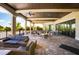 Spacious community clubhouse patio with numerous tables and seating at 17704 Gawthrop Dr # 402, Bradenton, FL 34211