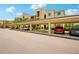 An image of a carport offering covered parking spaces for residents in a well-maintained community at 17704 Gawthrop Dr # 402, Bradenton, FL 34211