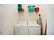 Clean laundry room with side-by-side washer and dryer at 17704 Gawthrop Dr # 402, Bradenton, FL 34211
