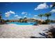 Relaxing pool area with waterfall and lounge chairs at 17704 Gawthrop Dr # 402, Bradenton, FL 34211