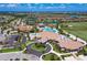 Aerial view of community with clubhouse, pool, and golf course at 17704 Gawthrop Dr # 402, Bradenton, FL 34211