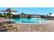 Large community pool with plenty of lounge chairs at 17704 Gawthrop Dr # 402, Bradenton, FL 34211