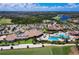 Aerial view of community with clubhouse, pool, and golf course at 17704 Gawthrop Dr # 402, Bradenton, FL 34211