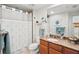 Clean bathroom with granite countertop and shower/tub combo at 808 3Rd W Ave # 514, Bradenton, FL 34205