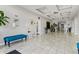 Bright condo lobby with seating and water feature at 808 3Rd W Ave # 514, Bradenton, FL 34205